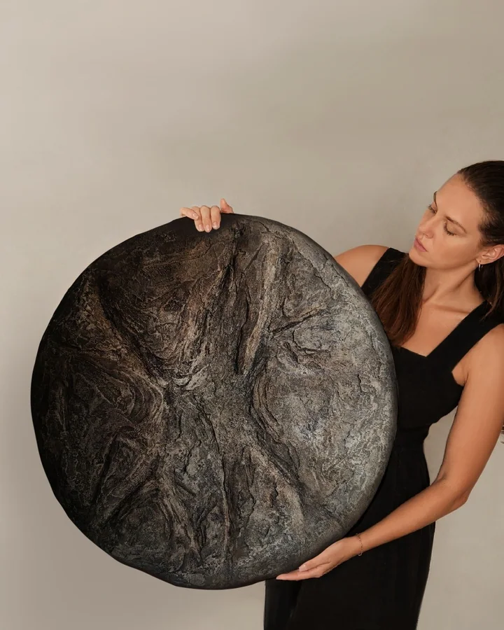 Fossil Carbon, handmade cement round wall piece